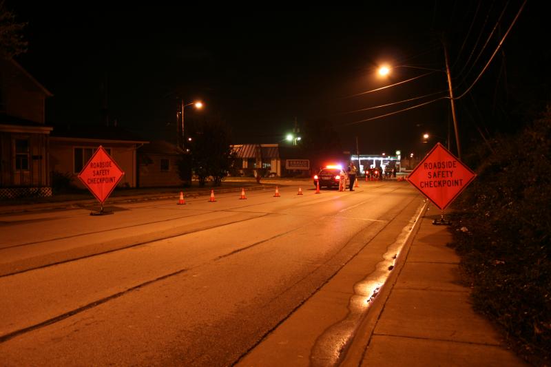 Caution cones and signs in the street.